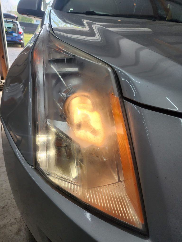This image has an empty alt attribute; its file name is cadillac_headlight_before-768x1024.png