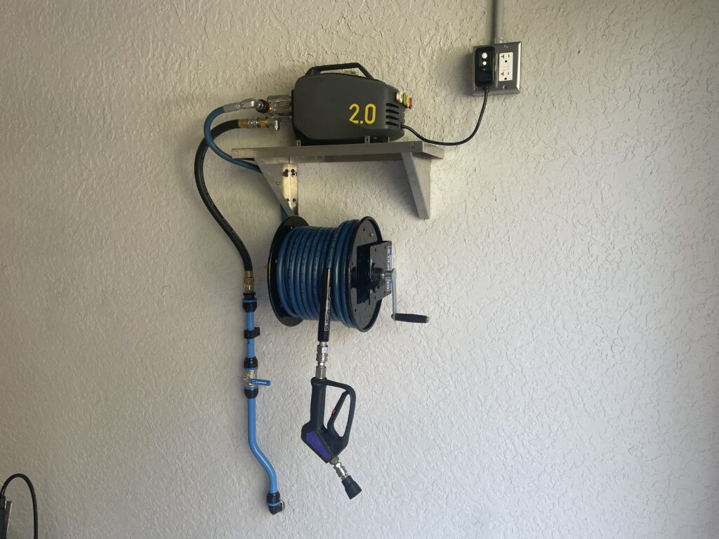 wall mounted pressure washer setup