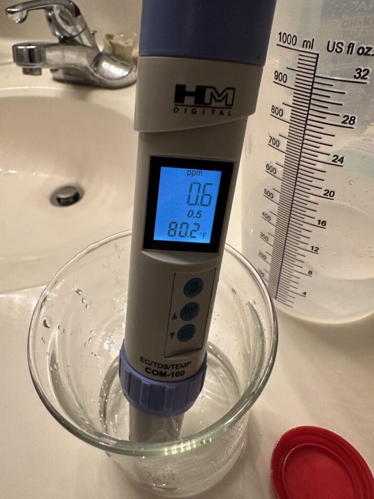 water softener testing gauge in water sample